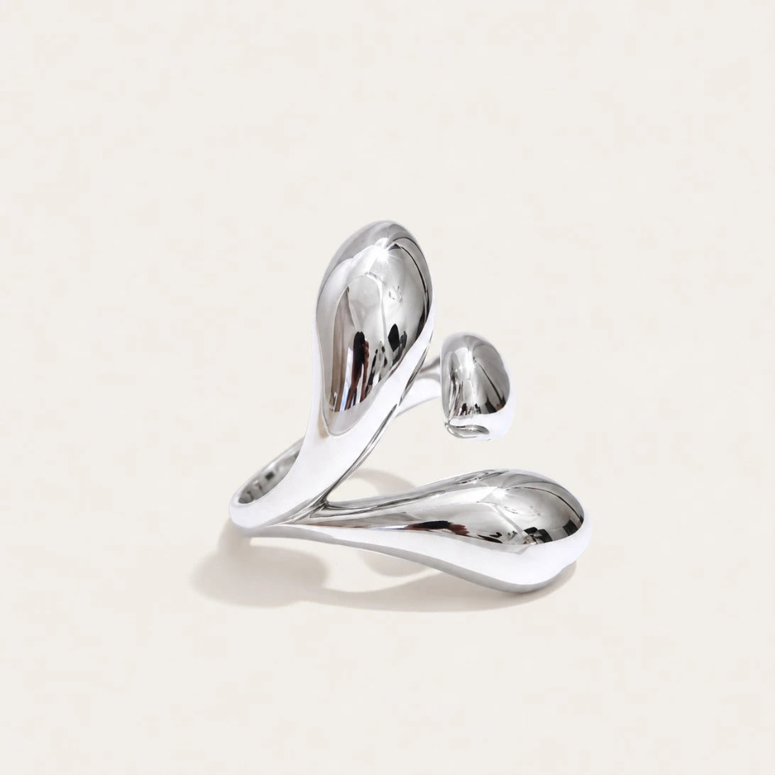 Silver-tone Gemelli RING: an open band with two polished drops rising side by side — Folie à Trois