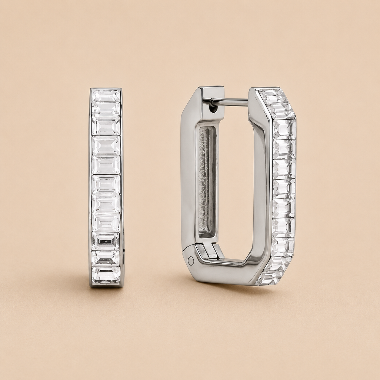 Silver rectangular hinged hoop earring channel-set with emerald-cut zirconia stones, shown side and front — Folie à Trois Girasole EARRINGS.