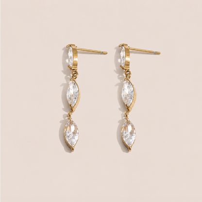 Gold drop earring with two marquise-cut white zirconia stones linked in a row — Folie à Trois Glint EARRINGS.