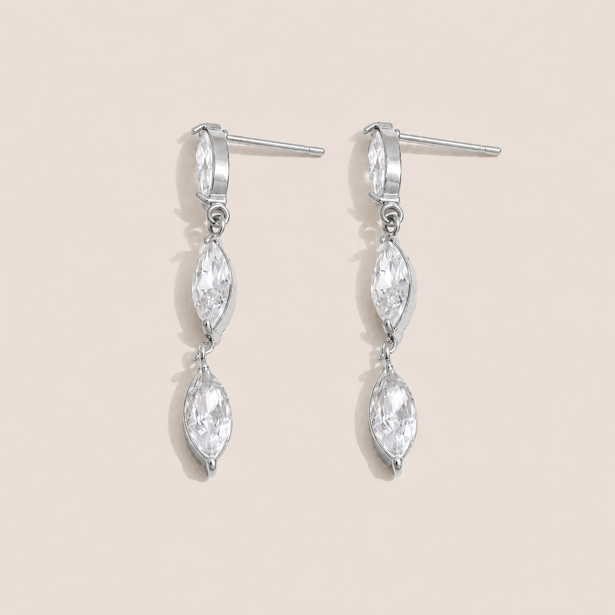 Silver drop earring with two marquise-cut white zirconia stones linked in a row — Folie à Trois Glint EARRINGS.