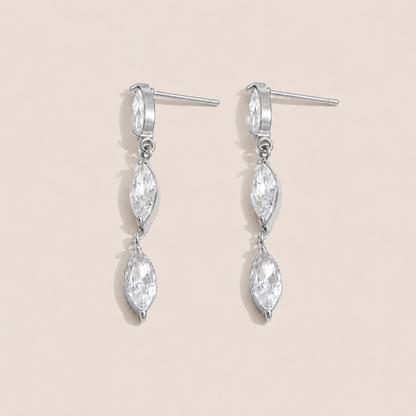 Silver drop earring with two marquise-cut white zirconia stones linked in a row — Folie à Trois Glint EARRINGS.