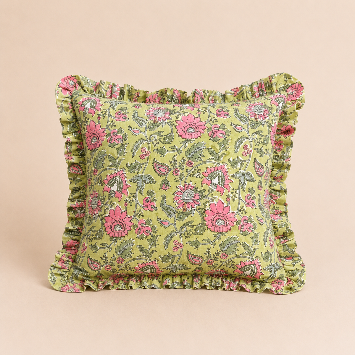 Green Hues Square cushion in olive green covered with a bold pink jacobean floral print and finished with a ruffled trim.