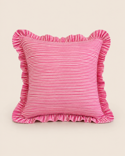 Flat lay of the Harmony Pink Square cushion in a bold orange linen with a white scalloped embroidered edge on a white background.