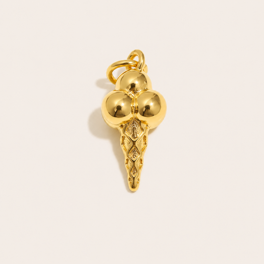 The Ice Cream CHARM in gold, shaped like a triple-scoop cone with a textured waffle base, shown alone on a plain studio background.