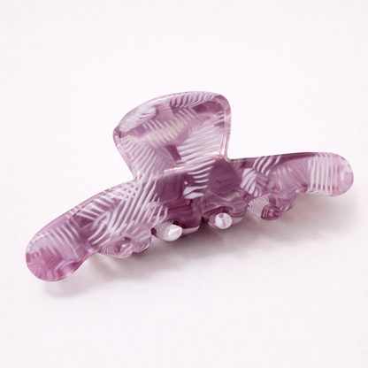 Iris HAIR CLIP large acetate claw clip in purple with a white herringbone-textured pattern, studio shot.