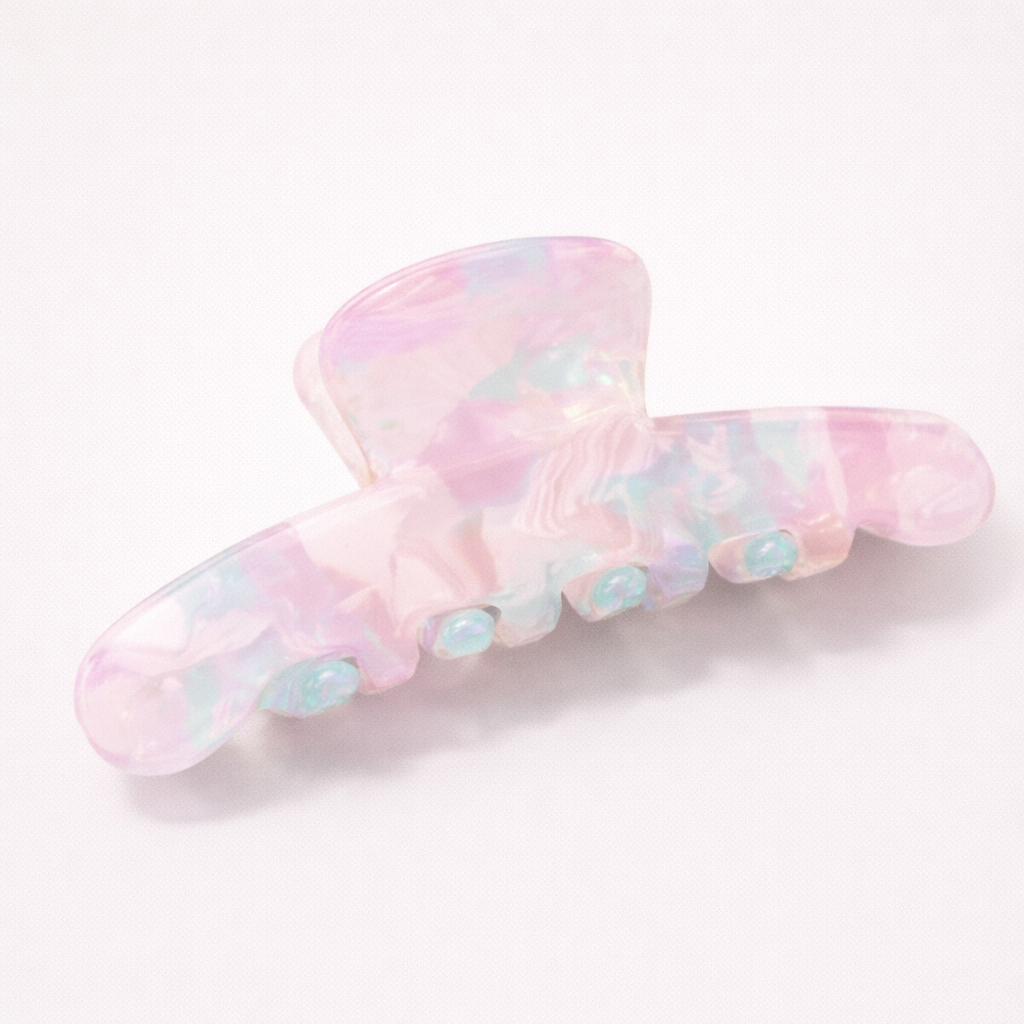 Iris HAIR CLIP large acetate claw clip in an iridescent pastel pink, lilac and mint pattern, studio shot.