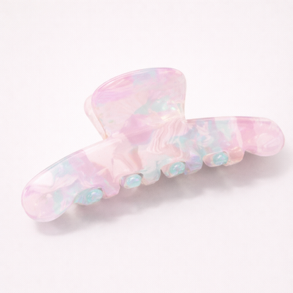Iris HAIR CLIP large acetate claw clip in an iridescent pastel pink, lilac and mint pattern, studio shot.