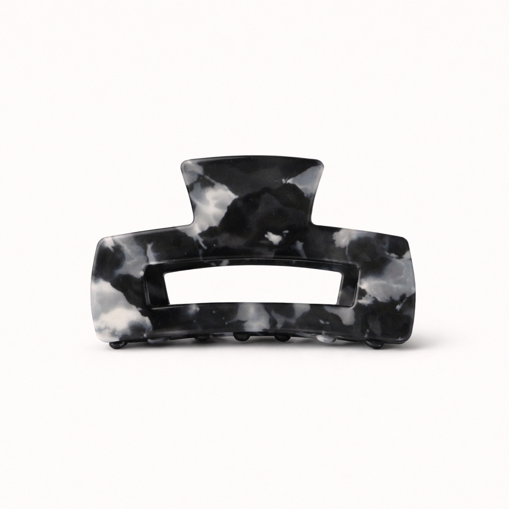 Black and white tie-dye marbled rectangular acetate claw clip with a cutout handle from the It Girl Big HAIR CLIP collection.