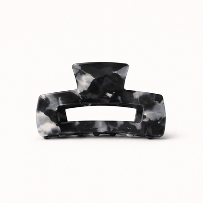 Black and white tie-dye marbled rectangular acetate claw clip with a cutout handle from the It Girl Big HAIR CLIP collection.