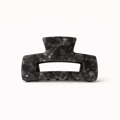 Charcoal grey marbled rectangular acetate claw clip with a cutout handle from the It Girl Big HAIR CLIP collection.
