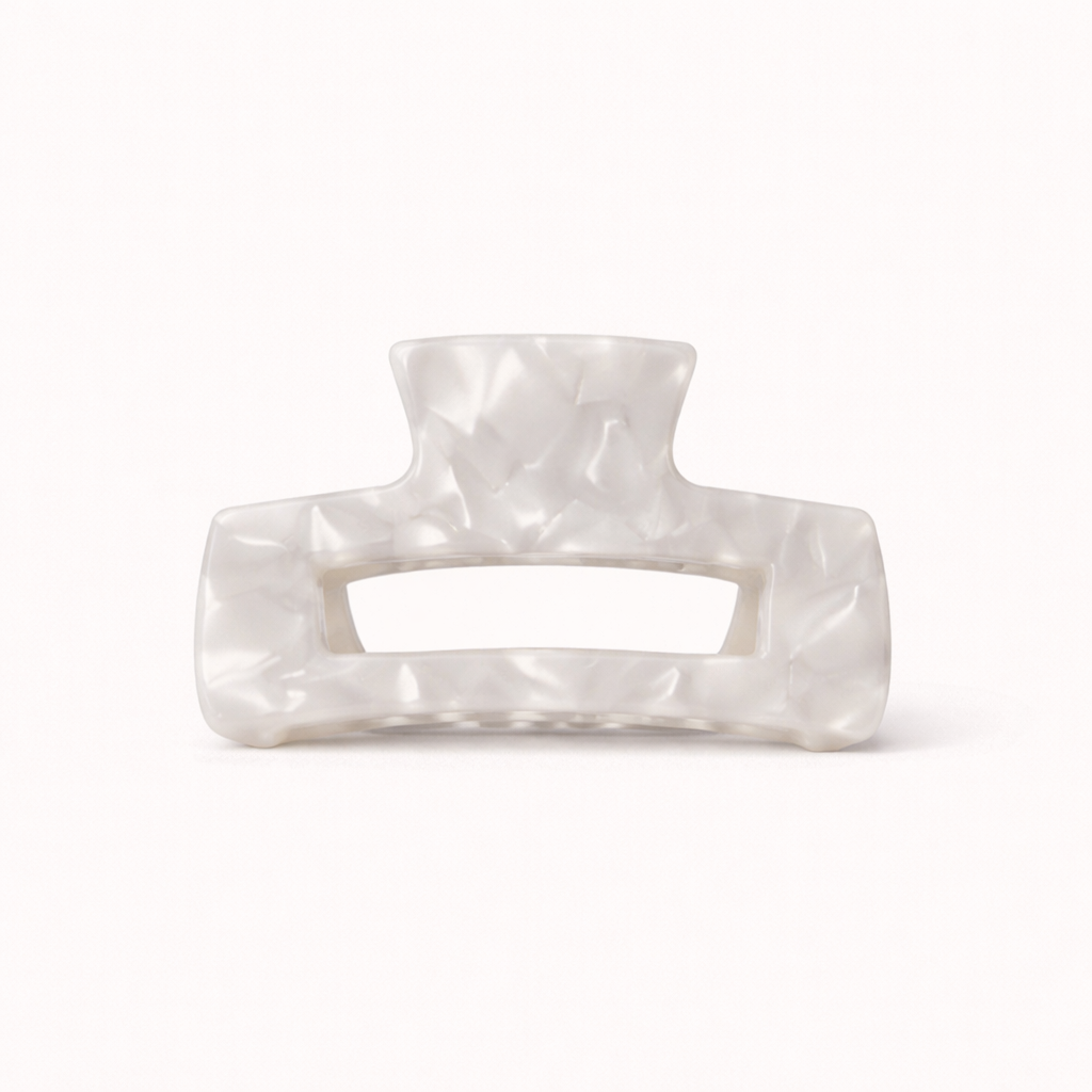 White pearl faceted rectangular acetate claw clip with a cutout handle from the It Girl Big HAIR CLIP collection.