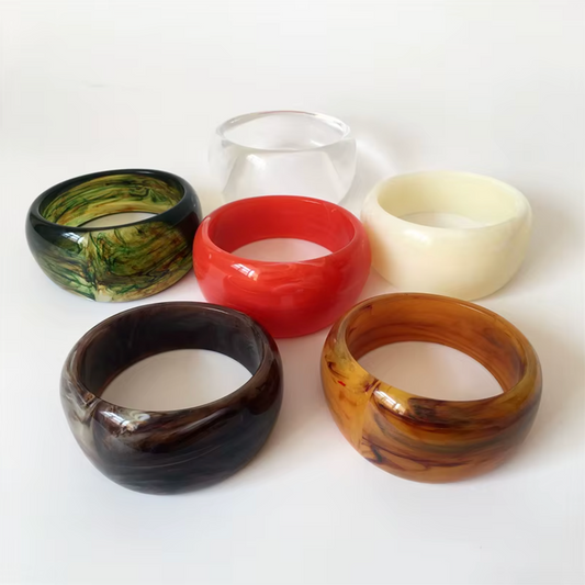 Ivana Acrylic BRACELET group shot of six chunky bangles in green marble, clear, cream, red, dark brown and amber swirl.