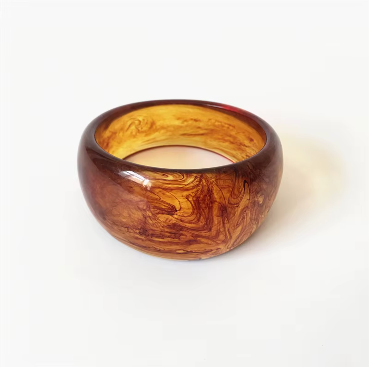 Ivana Acrylic BRACELET chunky bangle in an amber and burgundy swirl acrylic, studio close-up on white.