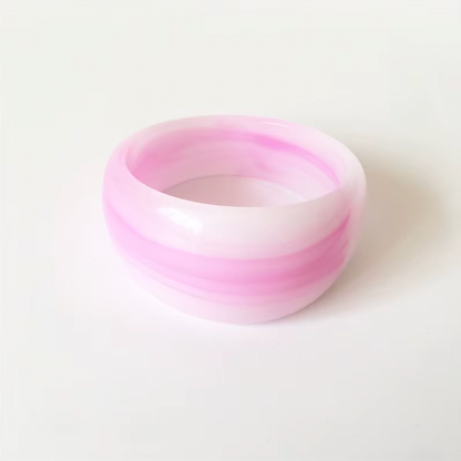 Ivana Acrylic BRACELET chunky bangle in a pink and white swirl acrylic, studio close-up on white.