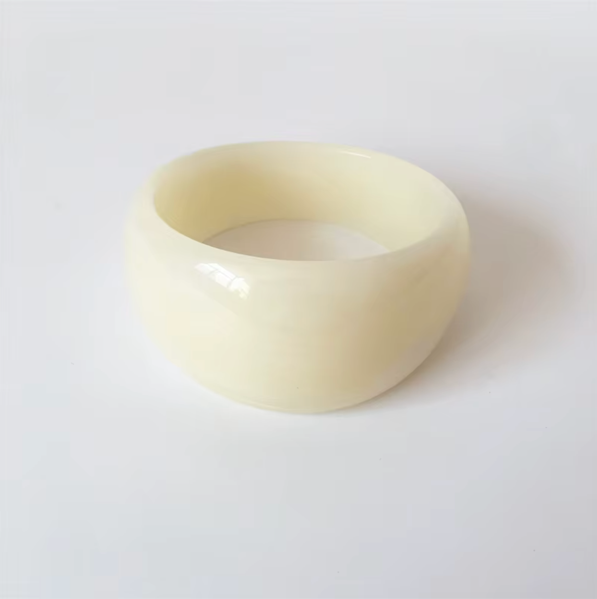 Ivana Acrylic BRACELET chunky bangle in a pale ivory acrylic, studio close-up on white.