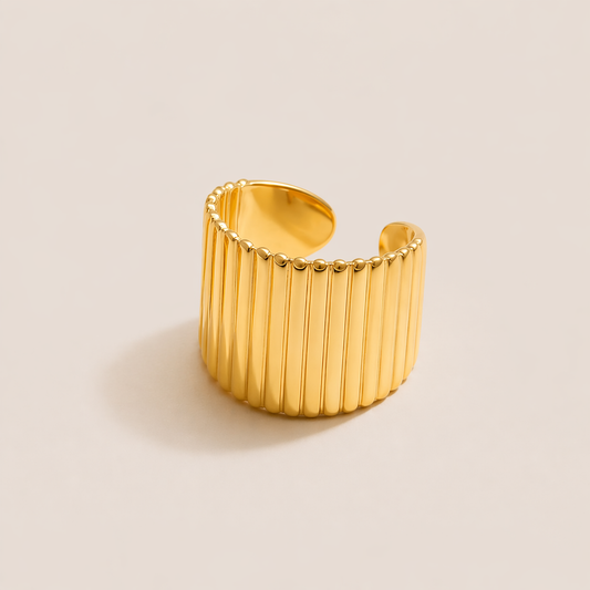 Gold Ivette EAR CUFF with a wide fluted, ribbed texture and a smooth, sculptural open-back cuff band design.
