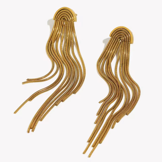 Kiss and Tell Earrings in gold, cascading strands of fine snake chain fringe from an arched stud, shown as a pair.
