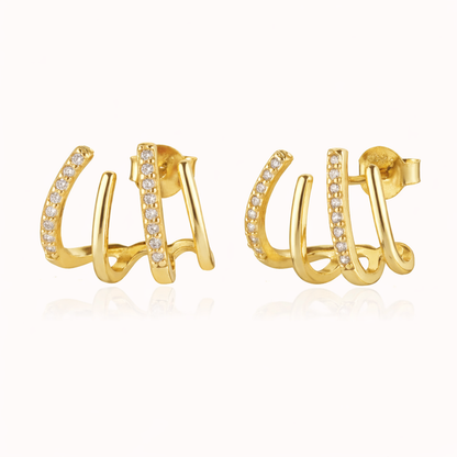 The Lennon EARRINGS are gold triple-band studs, one pave-lined, curving upward for a sculptural stacked look.