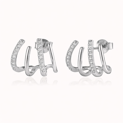 The Lennon EARRINGS are shown in silver, with three curved bands, one lined in sparkling round crystals.