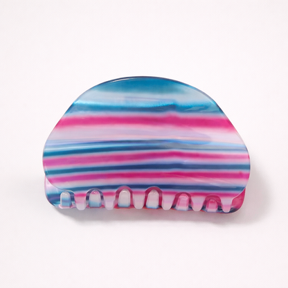 Livvy HAIR CLIP dome-shaped acetate claw clip in horizontal blue, pink and navy striped pattern, studio shot.
