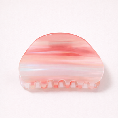 Livvy HAIR CLIP dome-shaped acetate claw clip in horizontal coral, pink and white striped pattern, studio shot.
