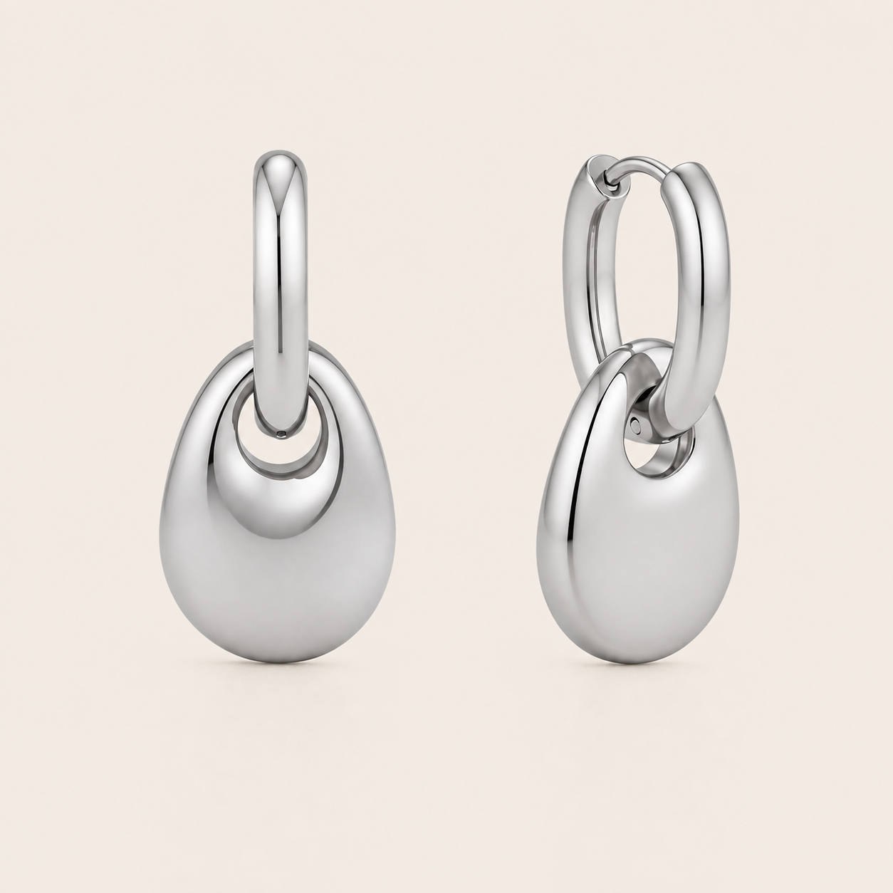 Silver chunky pebble-drop hoop earring with a glossy rounded teardrop dangling from a plain hoop — Folie à Trois Lucent EARRINGS.