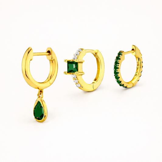 Maisie SET gathers three gold hoops: a teardrop dangle, a square-stone huggie, and a pave hoop, all in emerald green.
