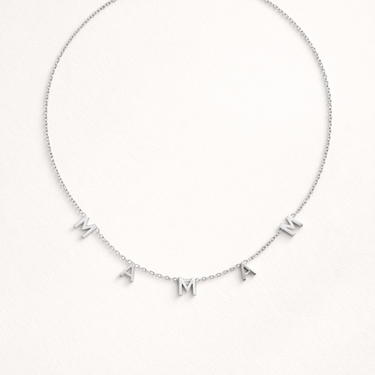 The Maman NECKLACE in silver, individual letters spelling MAMAN dangling from a fine chain, shown flat.