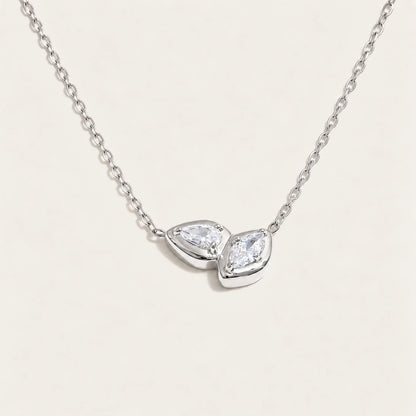 Silver-tone Marquise NECKLACE: a fine chain with a small double-marquise pendant framing a white zirconia — Folie à Trois