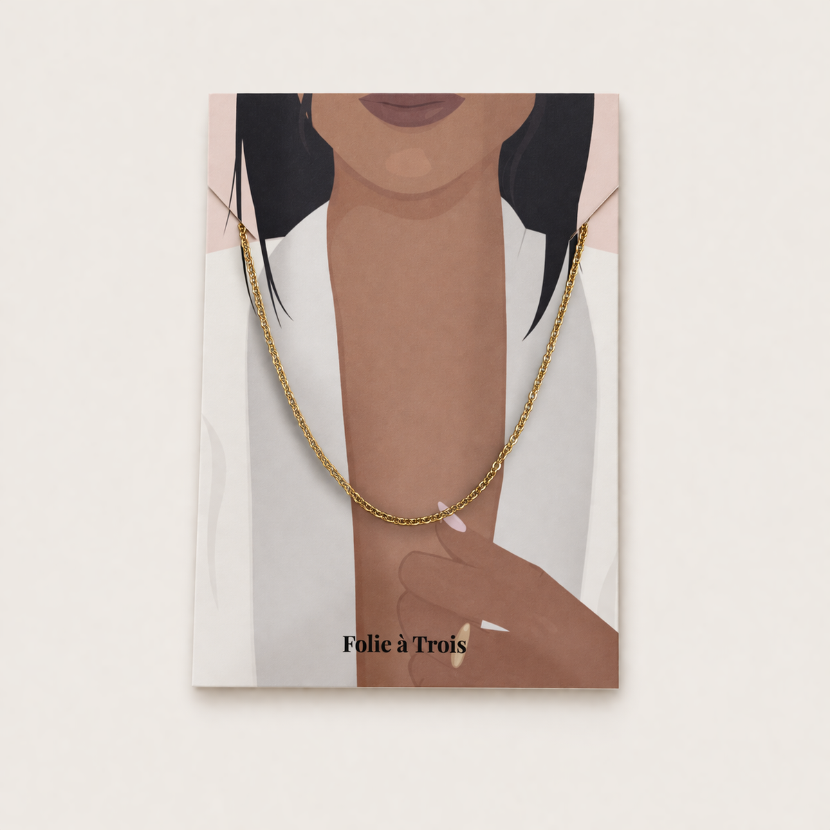 The Minimal NECKLACE displayed on an illustrated Folie a Trois necklace card, the plain gold chain shown with no charms.