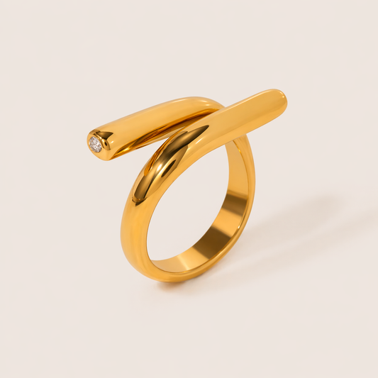 Gold ring with two parallel bars crossing an open band, one tipped with a small white zirconia stone — Folie à Trois Mischa RING.