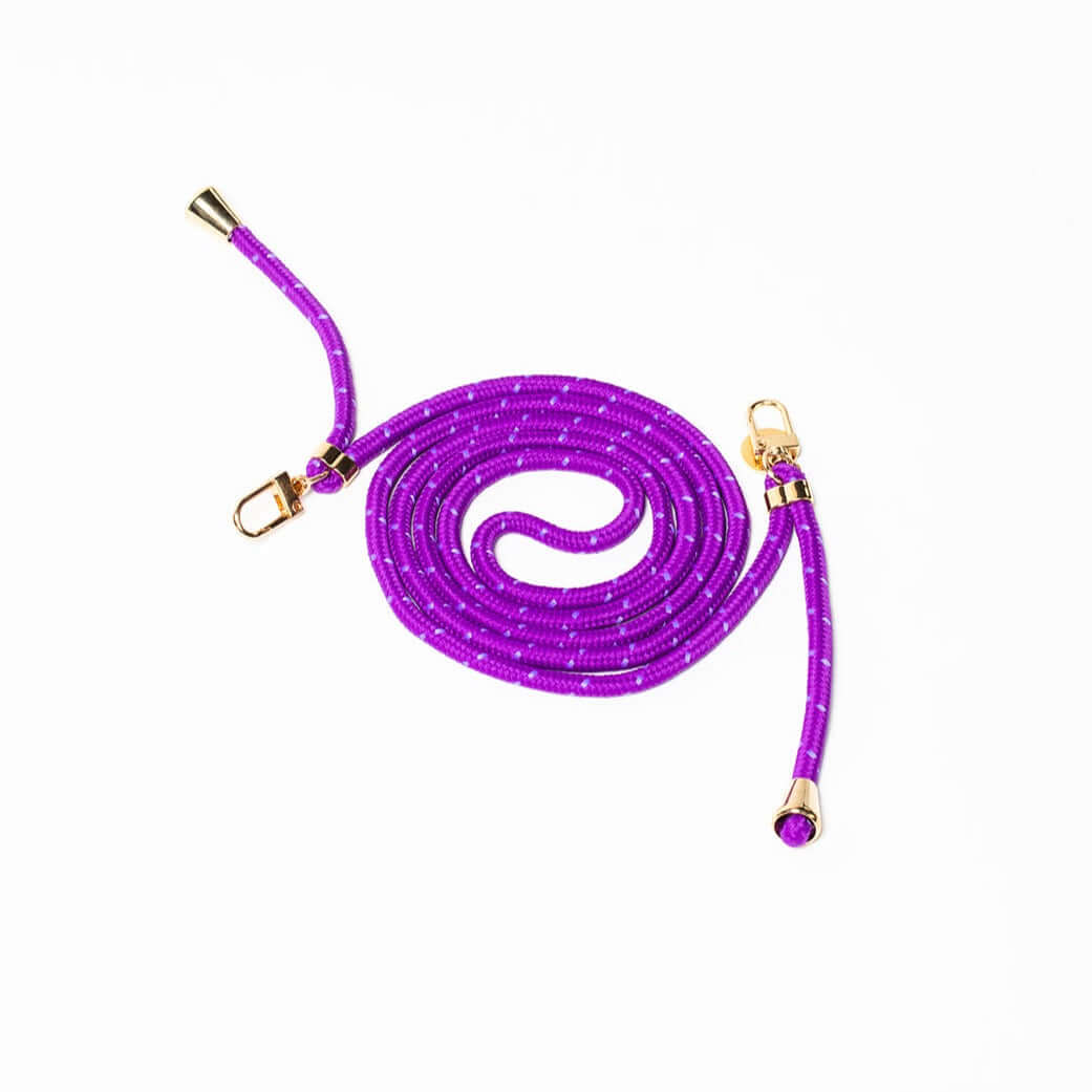 Bright purple Multi Colorful PHONE CORD with a white dot pattern, coiled with gold-tone hardware on white.
