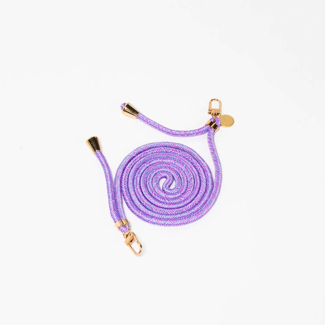 Lavender and white patterned Multi Colorful PHONE CORD coiled with gold-tone hardware on a white background.