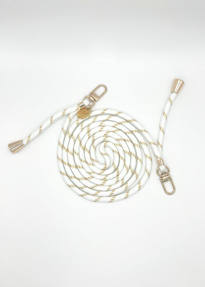 White Multi Colorful PHONE CORD with gold metallic flecks, coiled with silver-tone hardware on white.