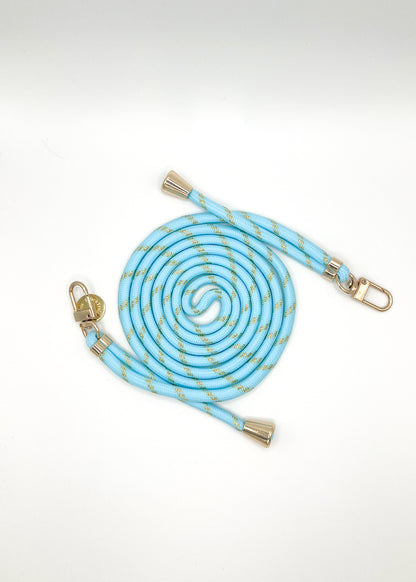 Light blue Multi Colorful PHONE CORD with gold metallic flecks, coiled with gold-tone hardware on white.