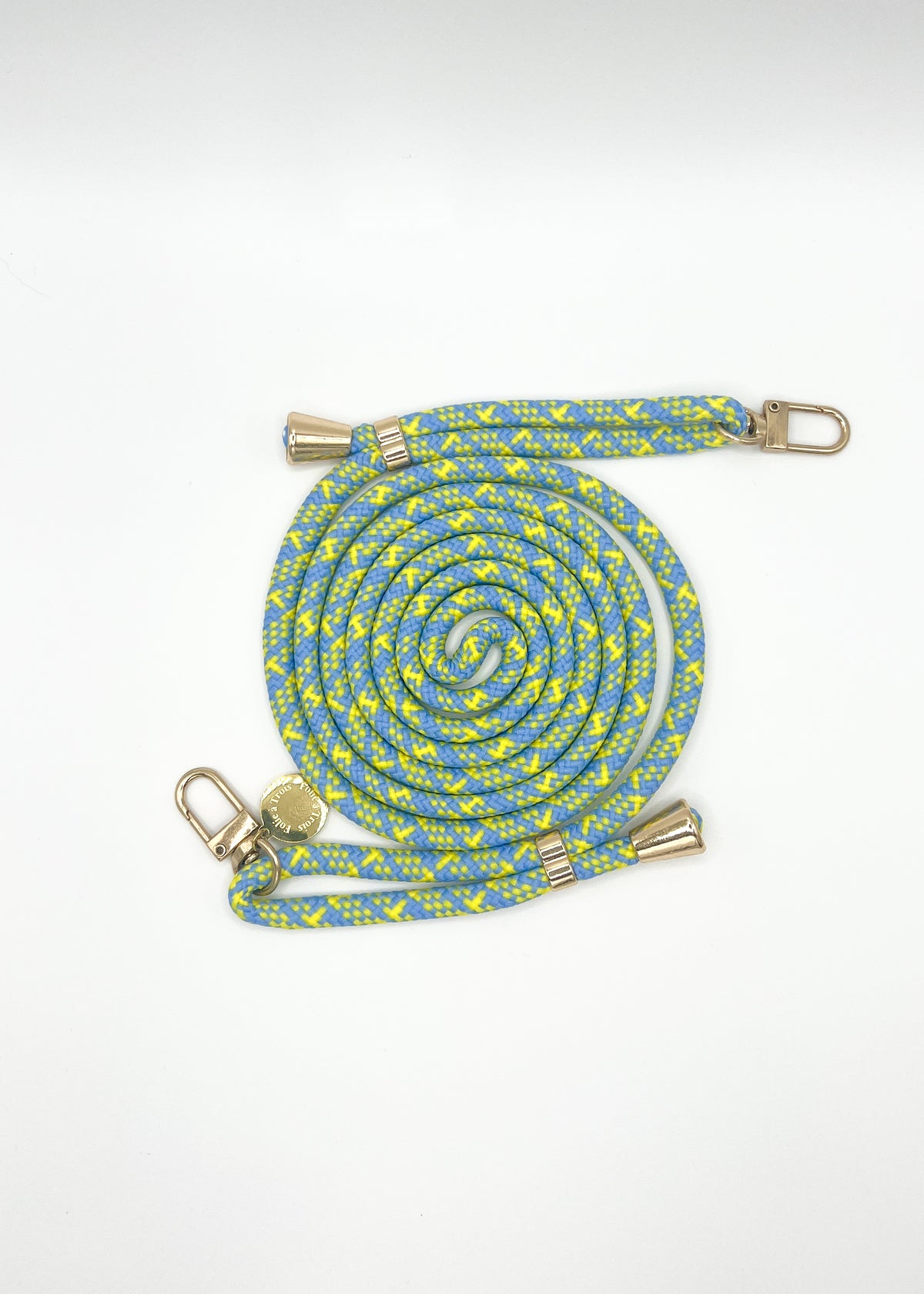 Blue and yellow patterned Multi Colorful PHONE CORD coiled with gold-tone hardware on a white background.