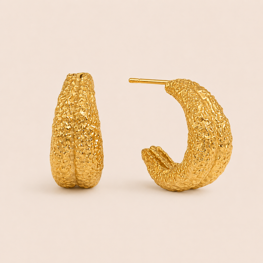 Gold chunky hoop earring with a richly textured, bark-like hammered surface — Folie à Trois Nerja EARRINGS.