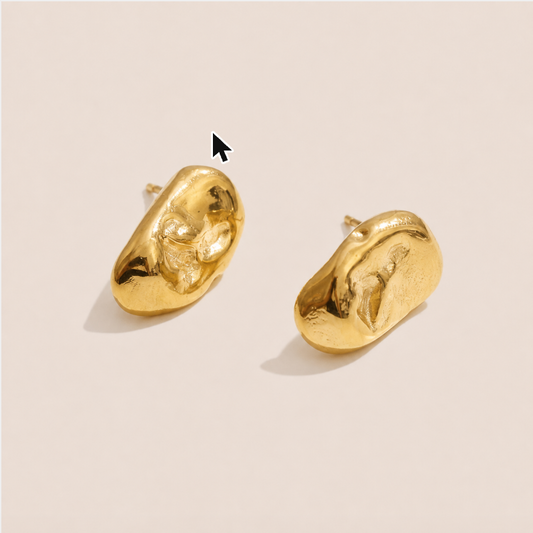 Gold chunky molten-texture stud earrings with an organic hammered surface on a cream backdrop — Folie à Trois Nimbus EARRINGS
