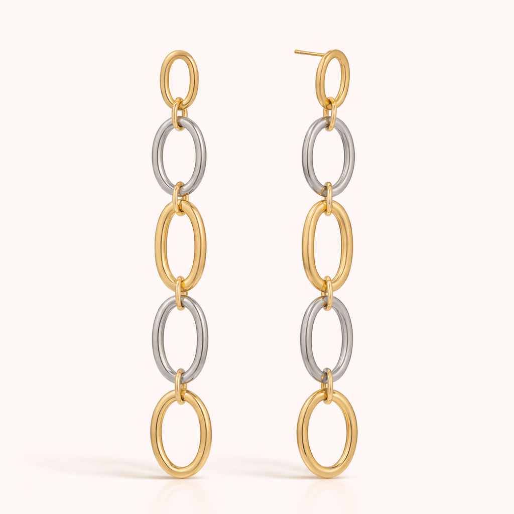 The No Apologies EARRINGS drop in a long chain of five alternating gold and silver oval links in a row.
