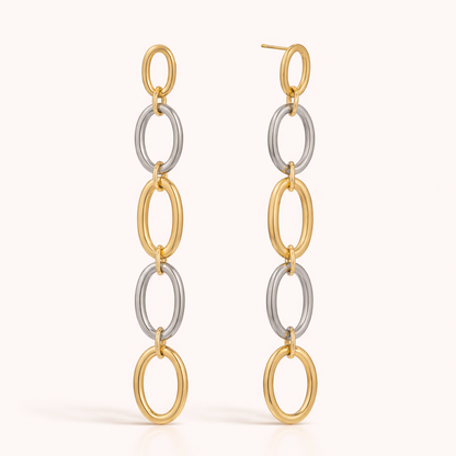 The No Apologies EARRINGS drop in a long chain of five alternating gold and silver oval links in a row.