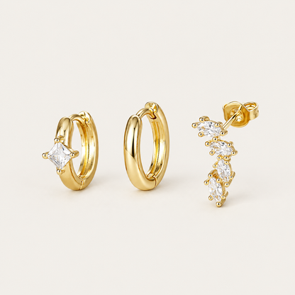 Three gold Folie à Trois Odile SET pieces: a plain hoop, a hoop set with a square crystal, and a marquise climber stud.