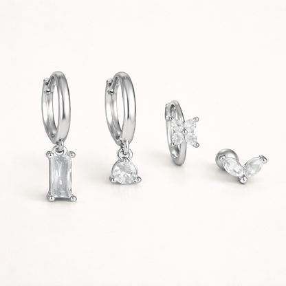 In silver tone, Perfect Earparty SET displays its baguette, teardrop, clover, and marquise stone pieces.