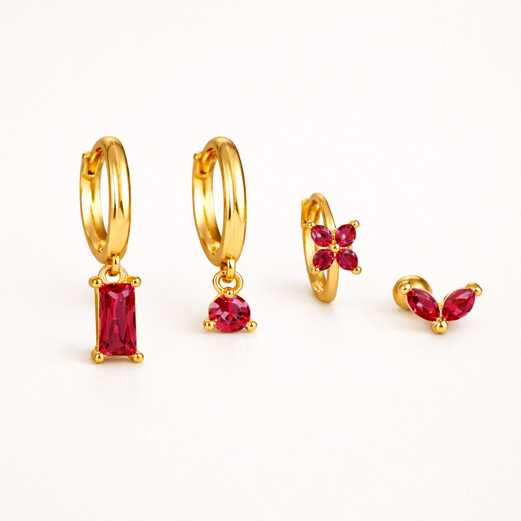 Perfect Earparty SET appears here in ruby red, its four gold pieces set with vivid red stones.