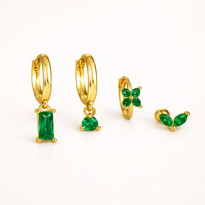 In emerald green, Perfect Earparty SET pairs its baguette, teardrop, clover, and marquise pieces in gold.