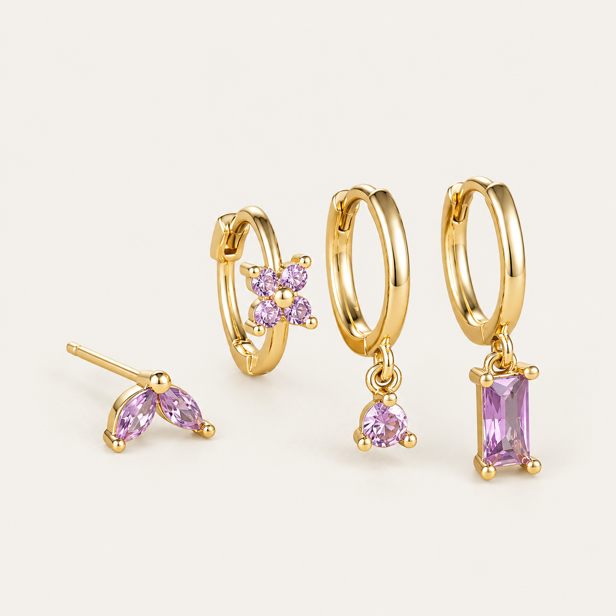 Perfect Earparty SET in gold with lilac stones: marquise stud, flower huggie, round drop hoop and baguette drop hoop