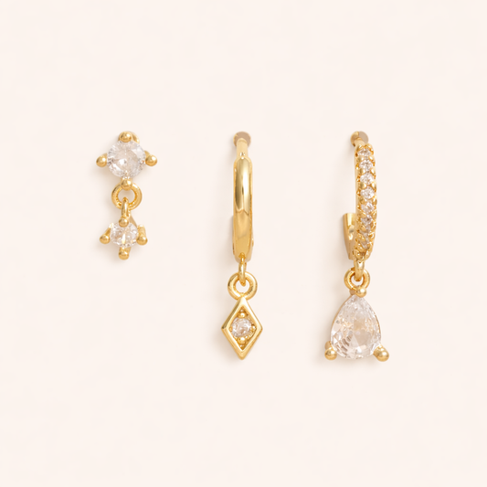 The Piper SET includes a double-crystal drop stud, a plain hoop with diamond drop, and a pave teardrop hoop.