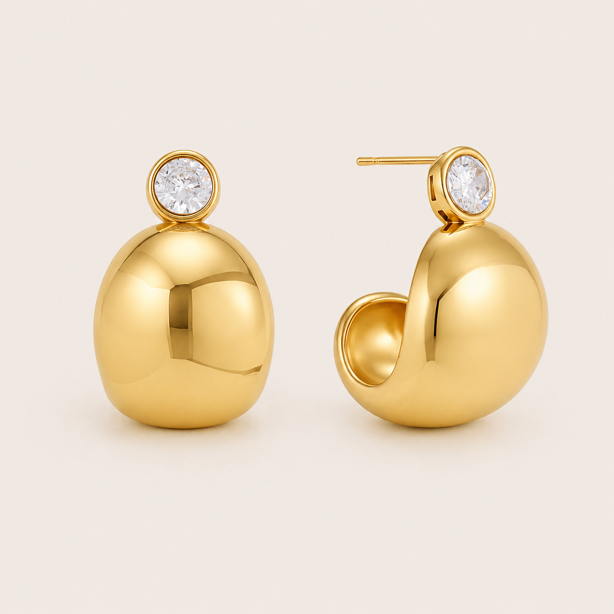 Gold chunky bean-shaped hoop earring topped with a round bezel-set white zirconia stud — Folie à Trois Plush EARRINGS.
