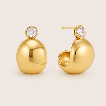 Gold chunky bean-shaped hoop earring topped with a round bezel-set white zirconia stud — Folie à Trois Plush EARRINGS.