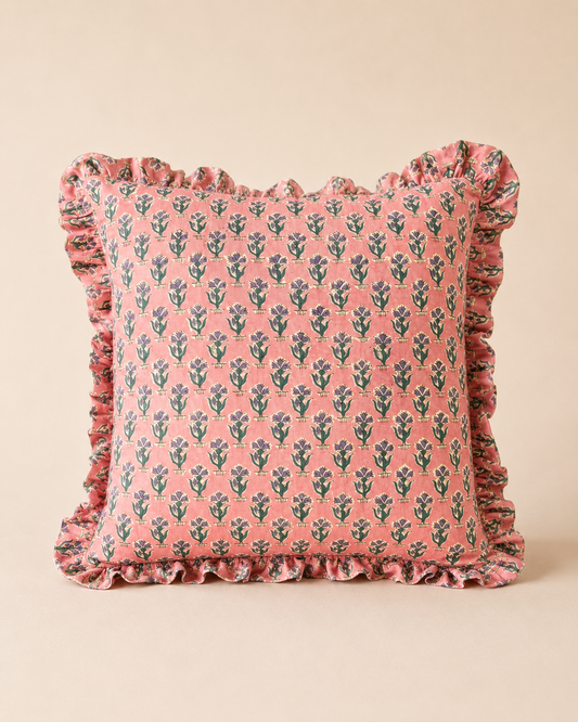 Two blush-pink square cushions with a red scalloped wave-stitch border layered together, showcasing the Razia Pink Square Cushion.
