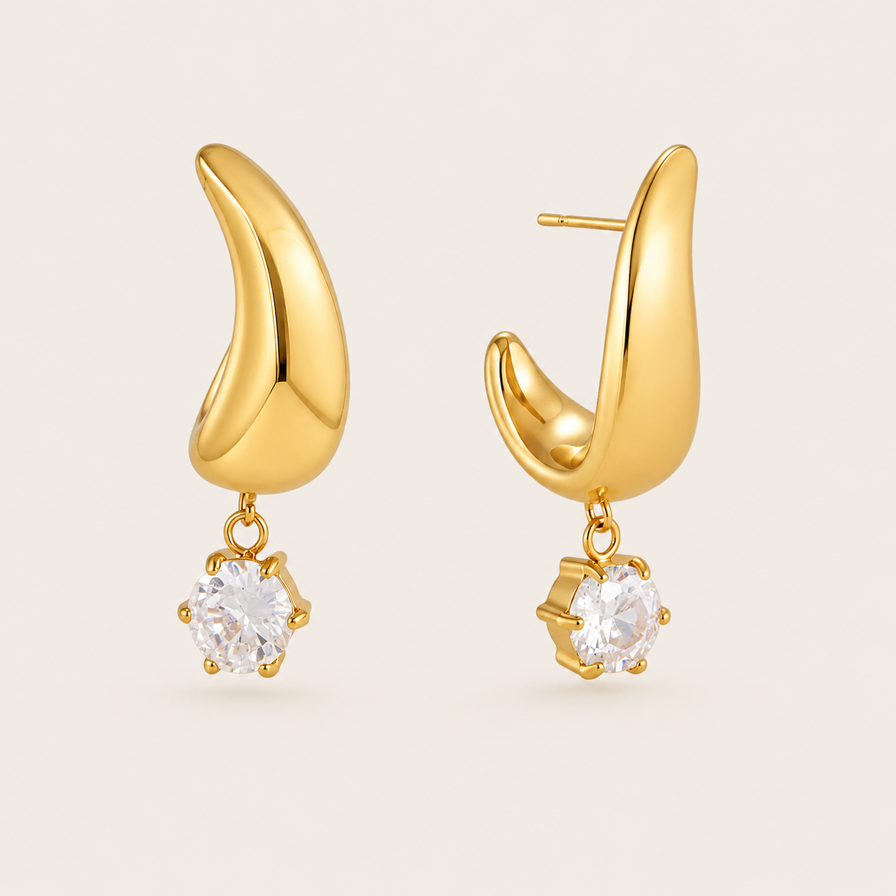 Gold curved claw-shaped stud earring with a round white zirconia stone dangling from the tip — Folie à Trois Ripple EARRINGS.